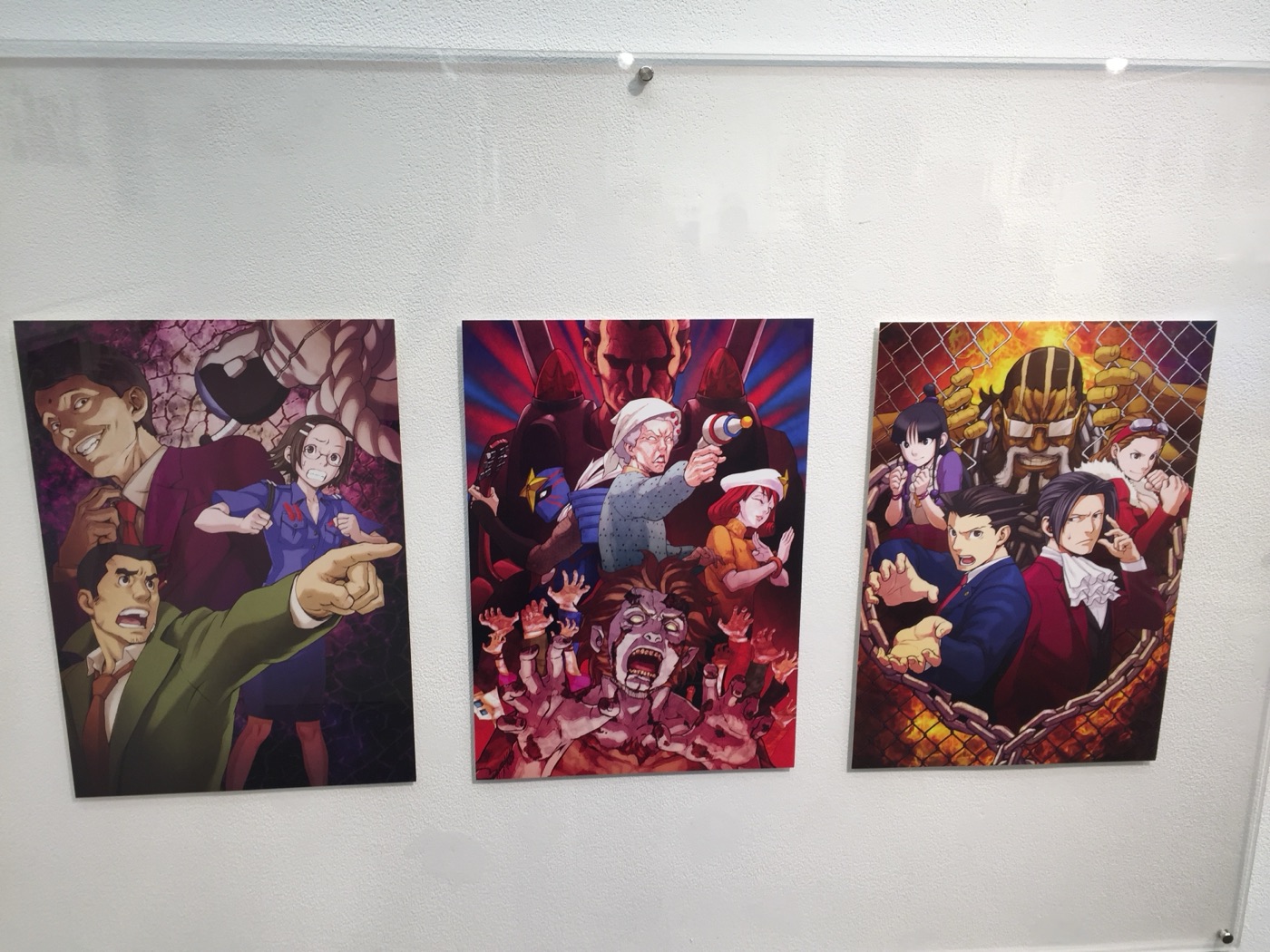 Horror-style posters from the Ace Attorney Joypolis attractions